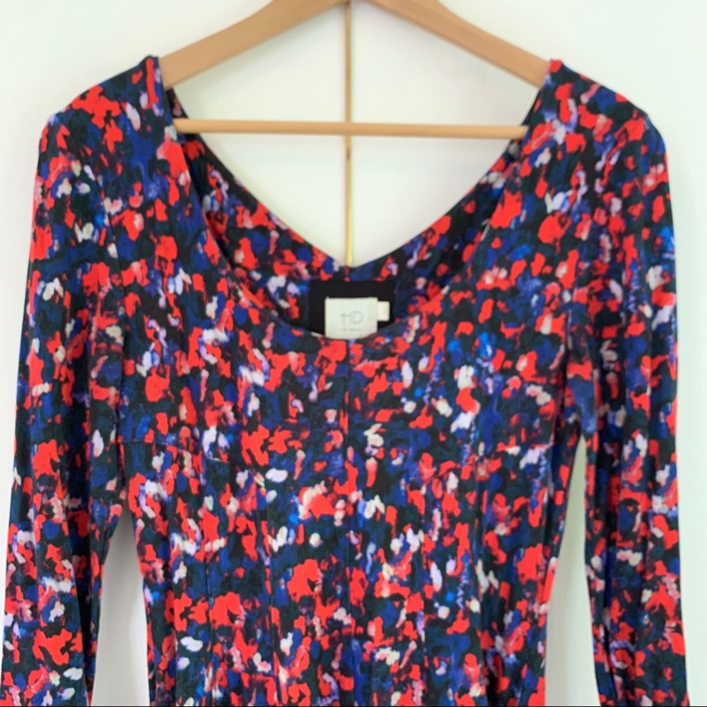 Red, black, and blue stretchy, long sleeve dress